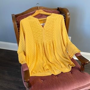 Fun top with see through sleeves!